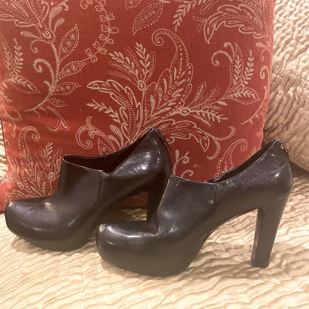 Black Franco Sarto platform booties.